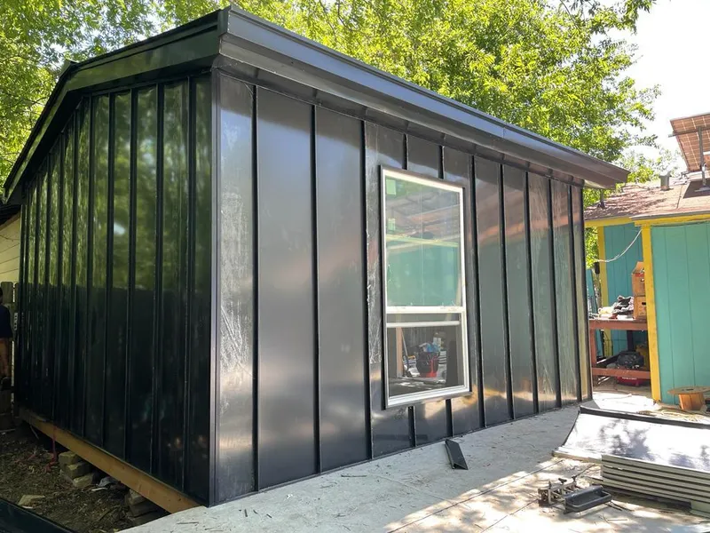 Black standing seam metal wall panels for Roof Inspection in Tiverton